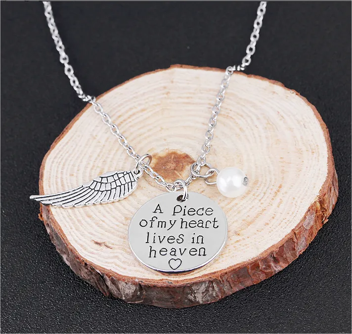 Angel Wing Necklace with Pearl - Engraved Round -   A piece of my heart lives in heaven 