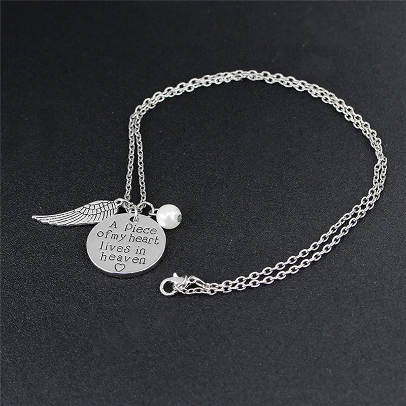 Angel Wing Necklace with Pearl - Engraved Round -   A piece of my heart lives in heaven 