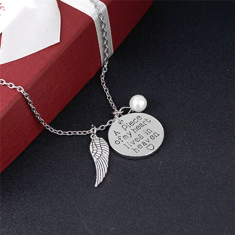 Angel Wing Necklace with Pearl - Engraved Round -   A piece of my heart lives in heaven 