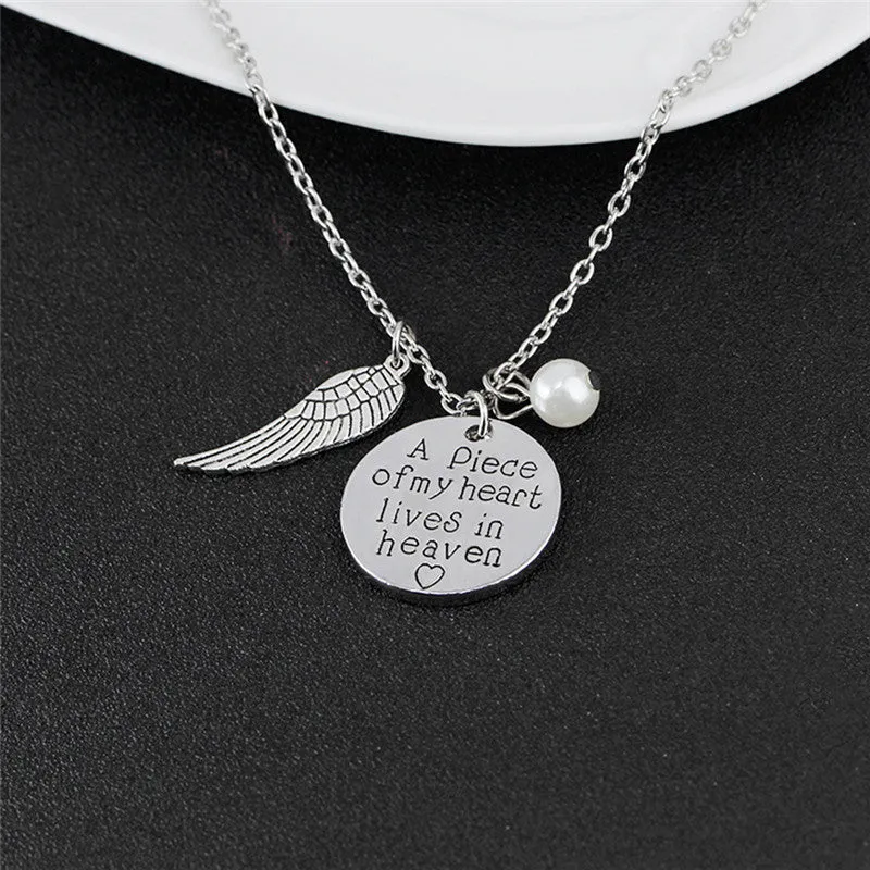 Angel Wing Necklace with Pearl - Engraved Round -   A piece of my heart lives in heaven 